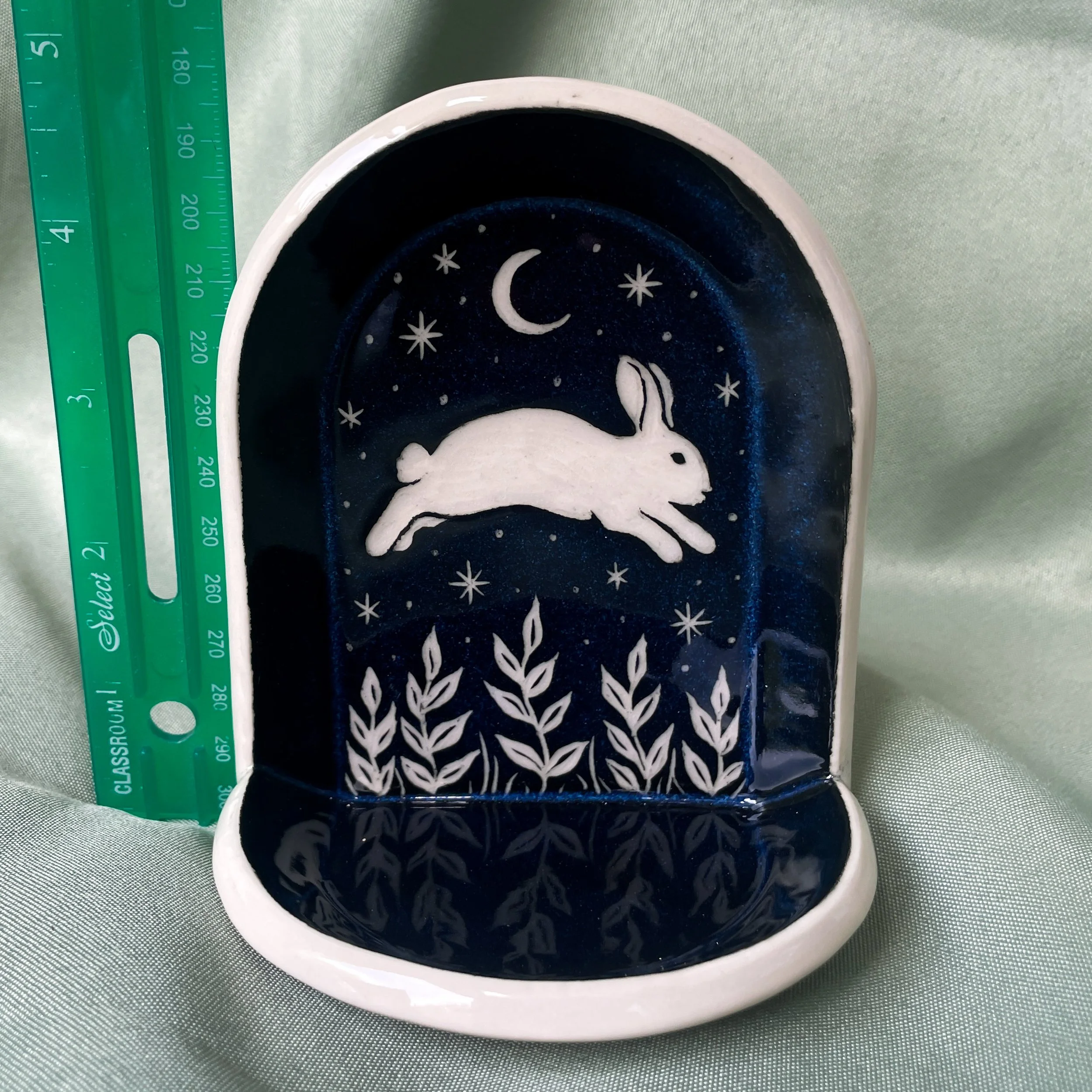rabbit altar shelf with ruler.JPEG