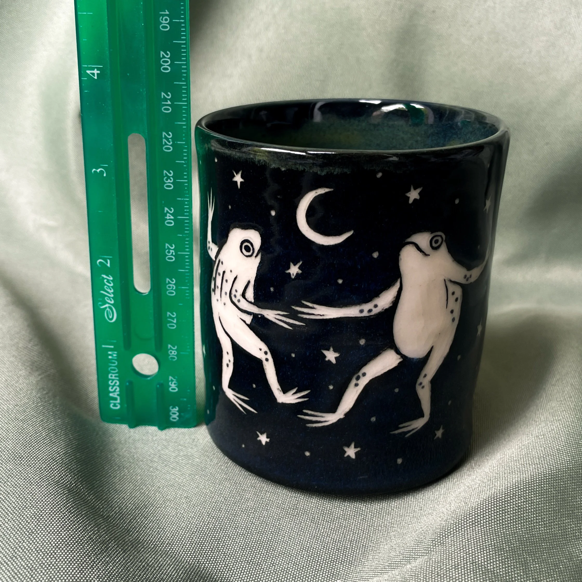 cup dancing frogs a ruler.JPEG
