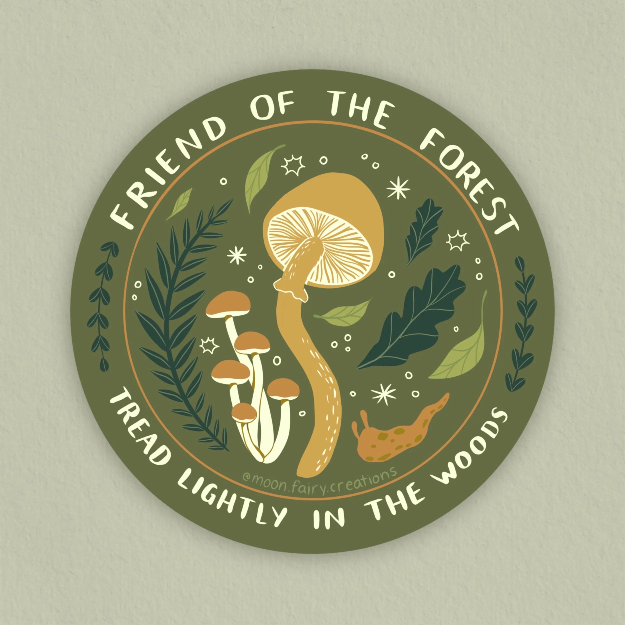 a sticker of forest elements and the words friend of the forest, tread lightly in the woods