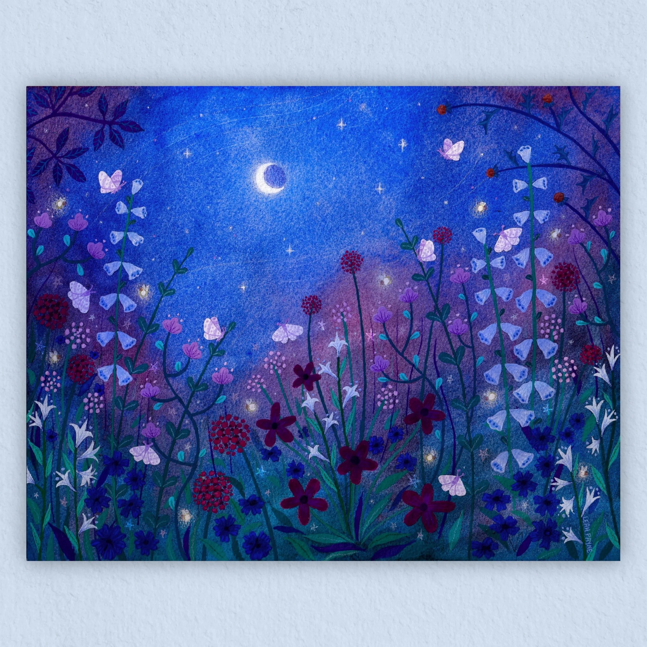 a watercolor art print of a midnight blue meadow with moths and flowers
