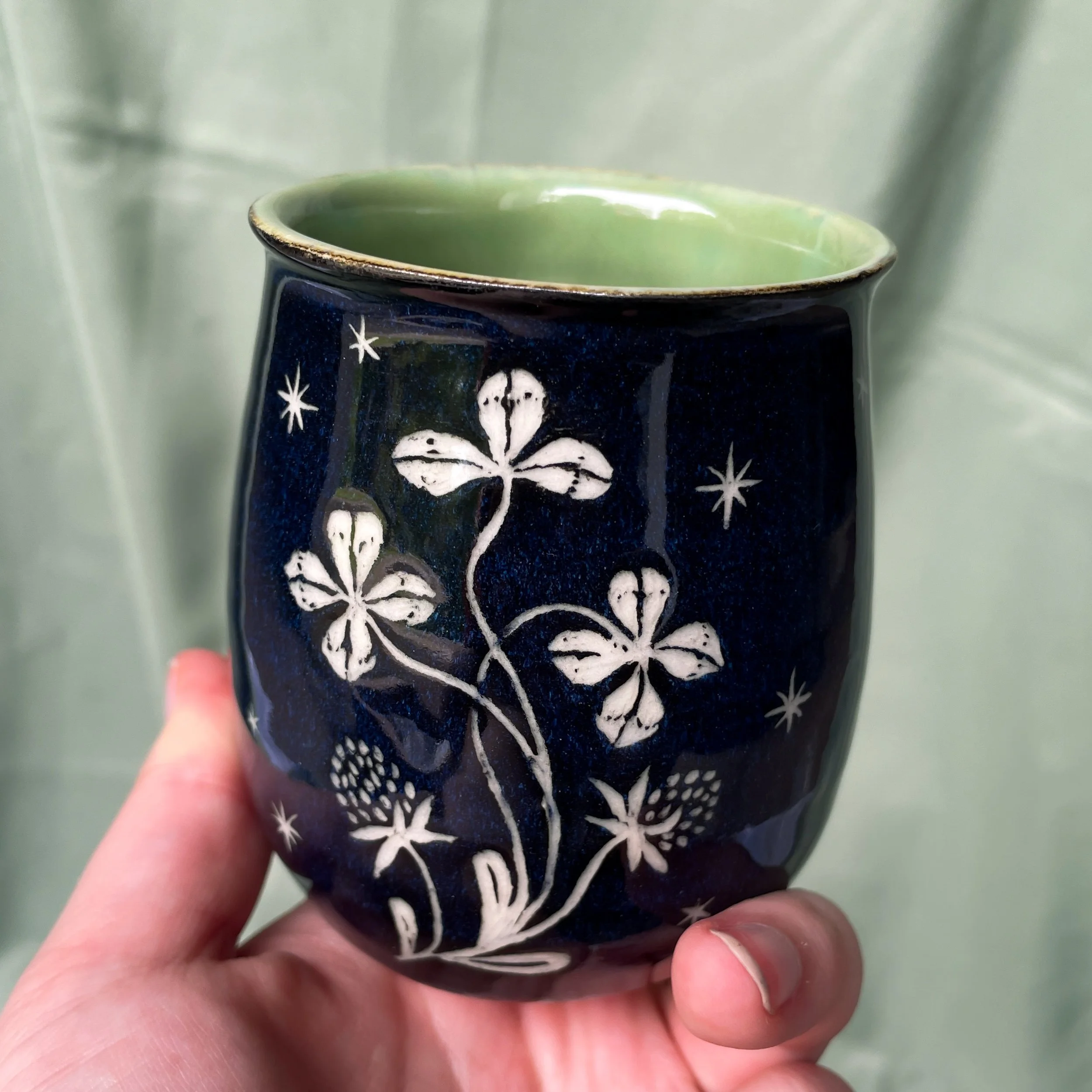 clover cup held.JPEG