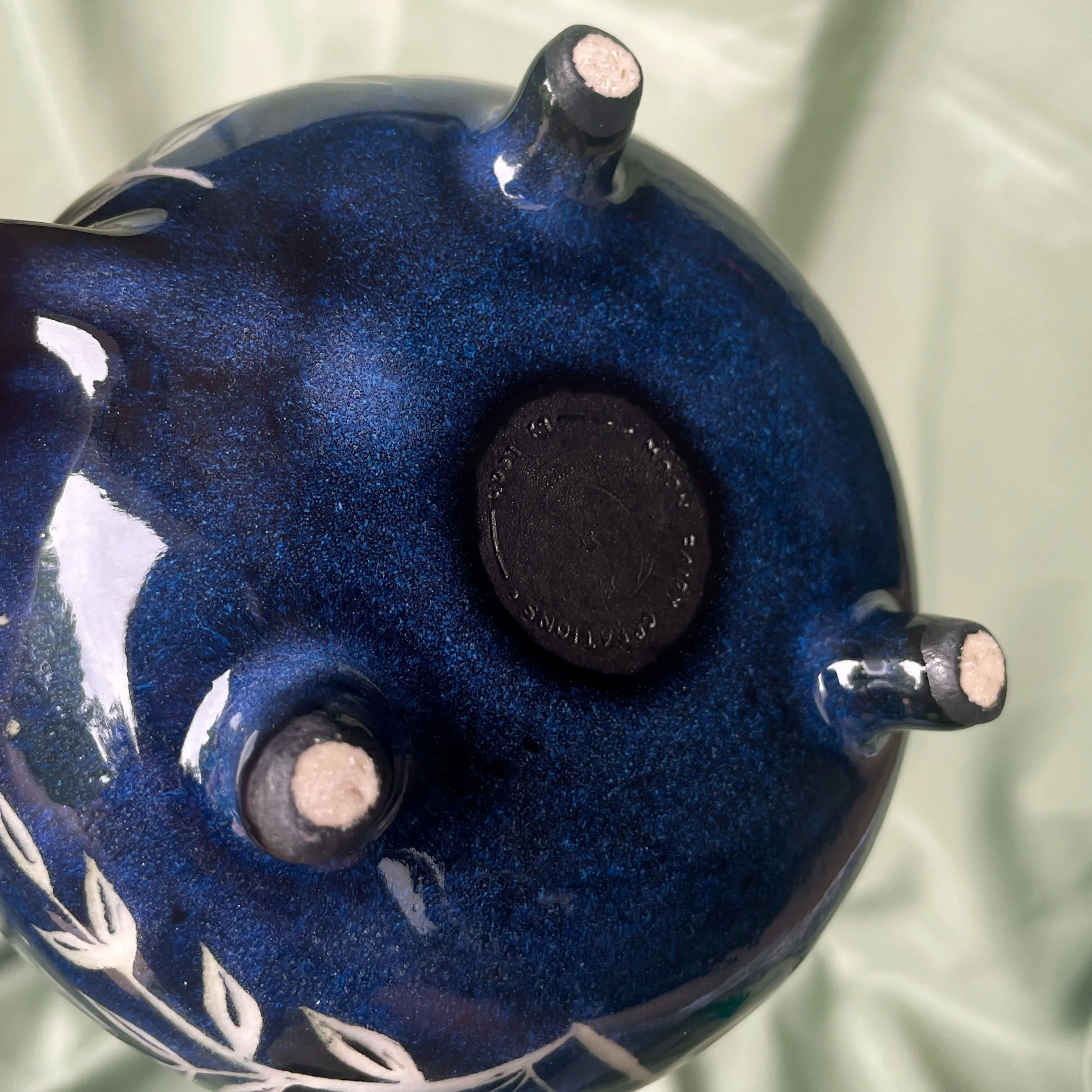 nocturnal creatures cauldron mug bottom feet.JPEG