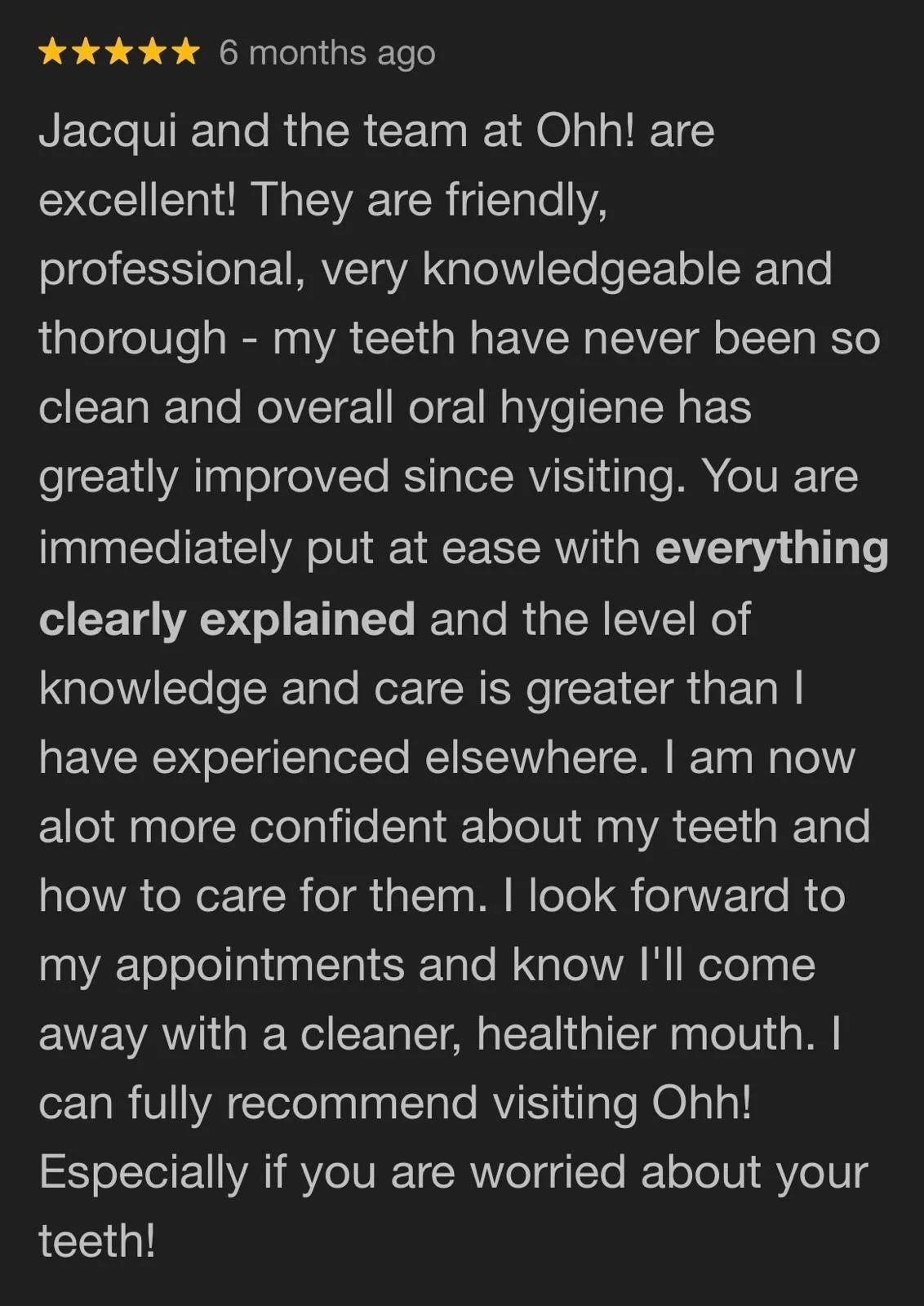 Screenshot of a five-star review praising Jacqui and the dental team at Ohh! for their friendly, professional, and knowledgeable service, particularly highlighting improvements in oral hygiene and confidence after dental visits.