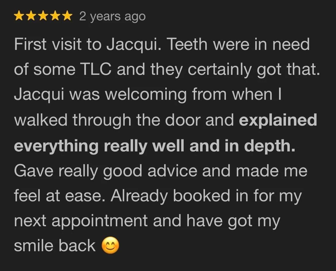 Screenshot of a Google review about a dental appointment, with a 5-star rating, mentioning a positive experience with Jacqui, dental care, and a future appointment.