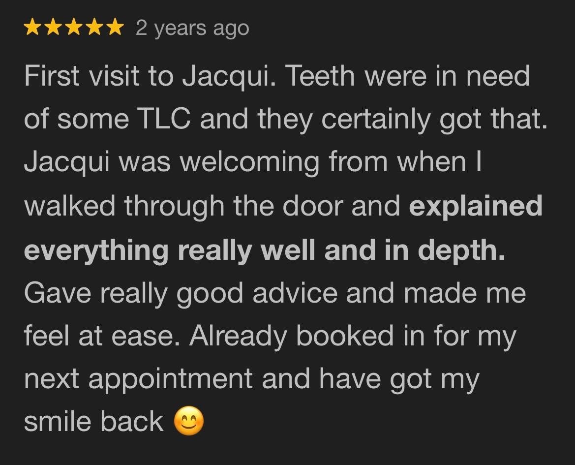 Screenshot of a Google review about a dental appointment, with a 5-star rating, mentioning a positive experience with Jacqui, dental care, and a future appointment.