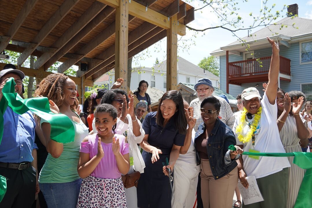 On Saturday we celebrated the Grand Opening of the Edgewater Food Forest in Mattapan! The space filled with neighbors, children ran between the young shrubs and trees, and the rhythm from the steel drum band filled the air. We heard from the stewards