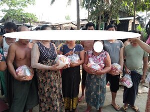 Donating Food in Hlaing Thayar