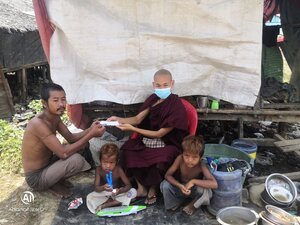 A Monk donates in South Dagon