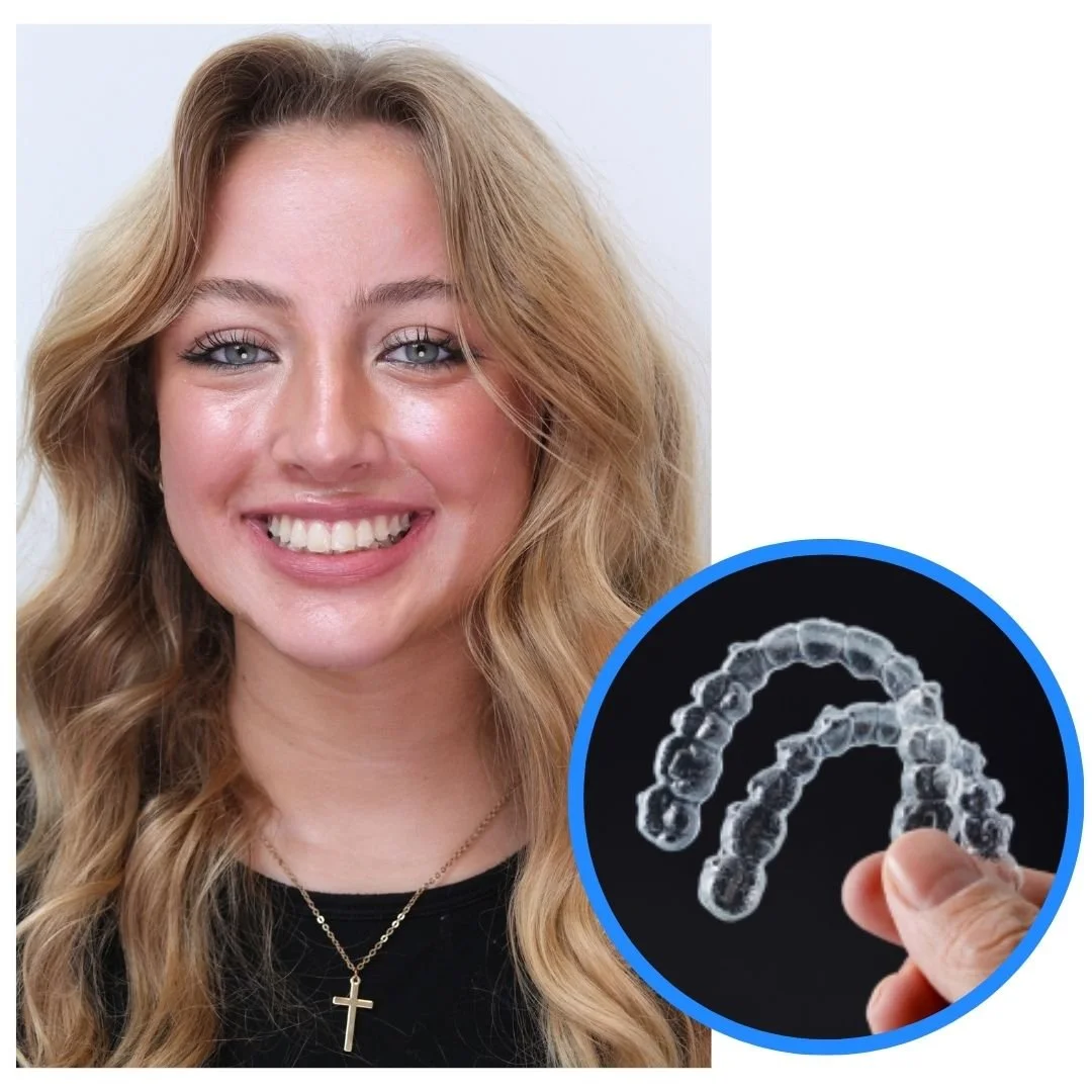 Smiling woman holding a clear aligner model – Does Insurance Cover Invisalign in Westfield, IN?