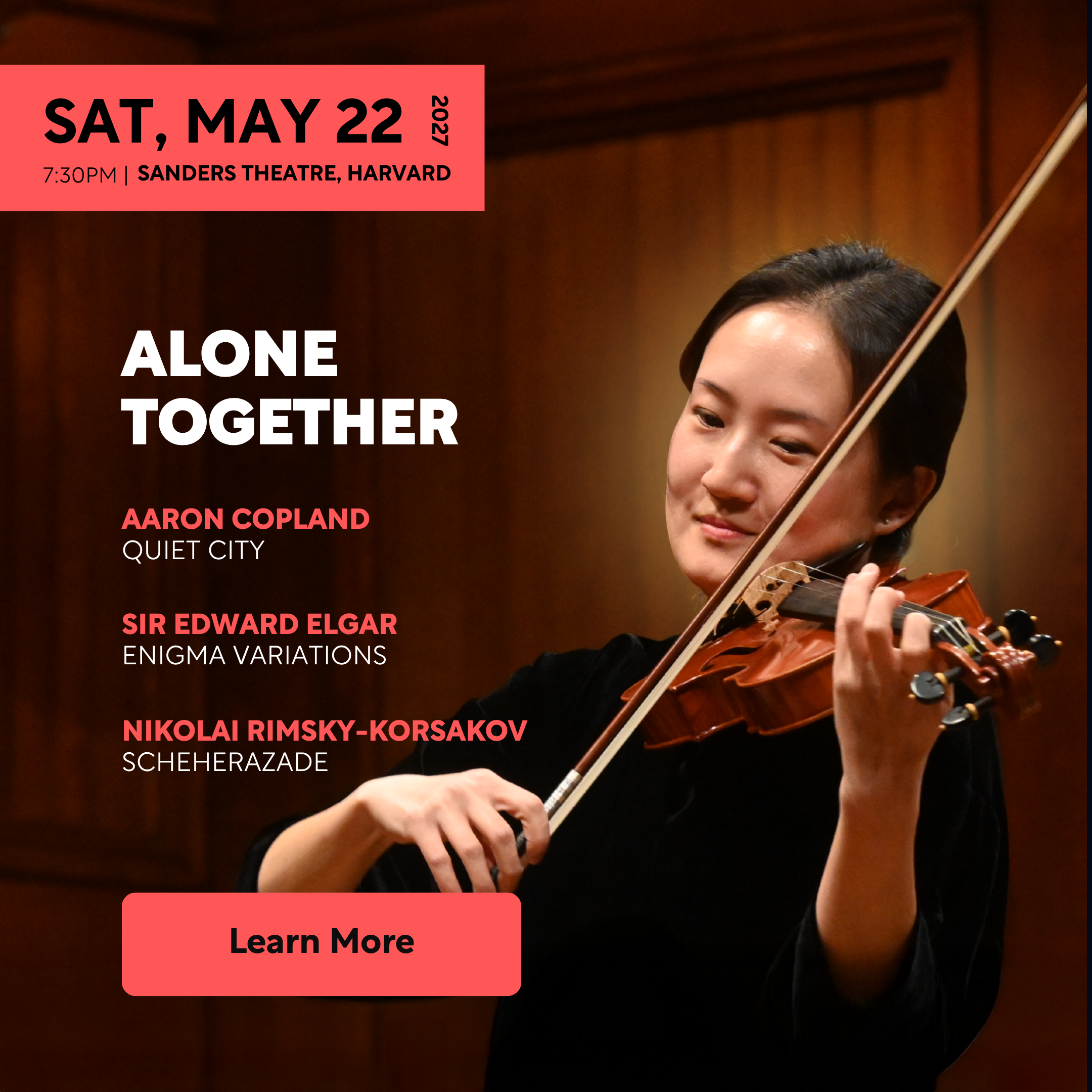 A violinist smiling as she plays her violin