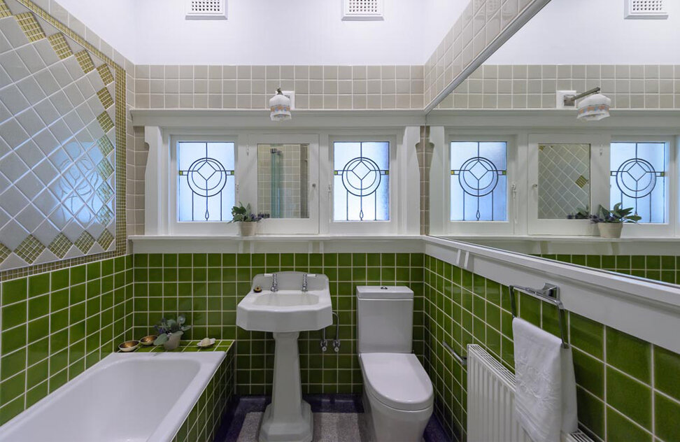 Stunning upgrade to the main bathroom with retention of original elements. Image: VSTYLE