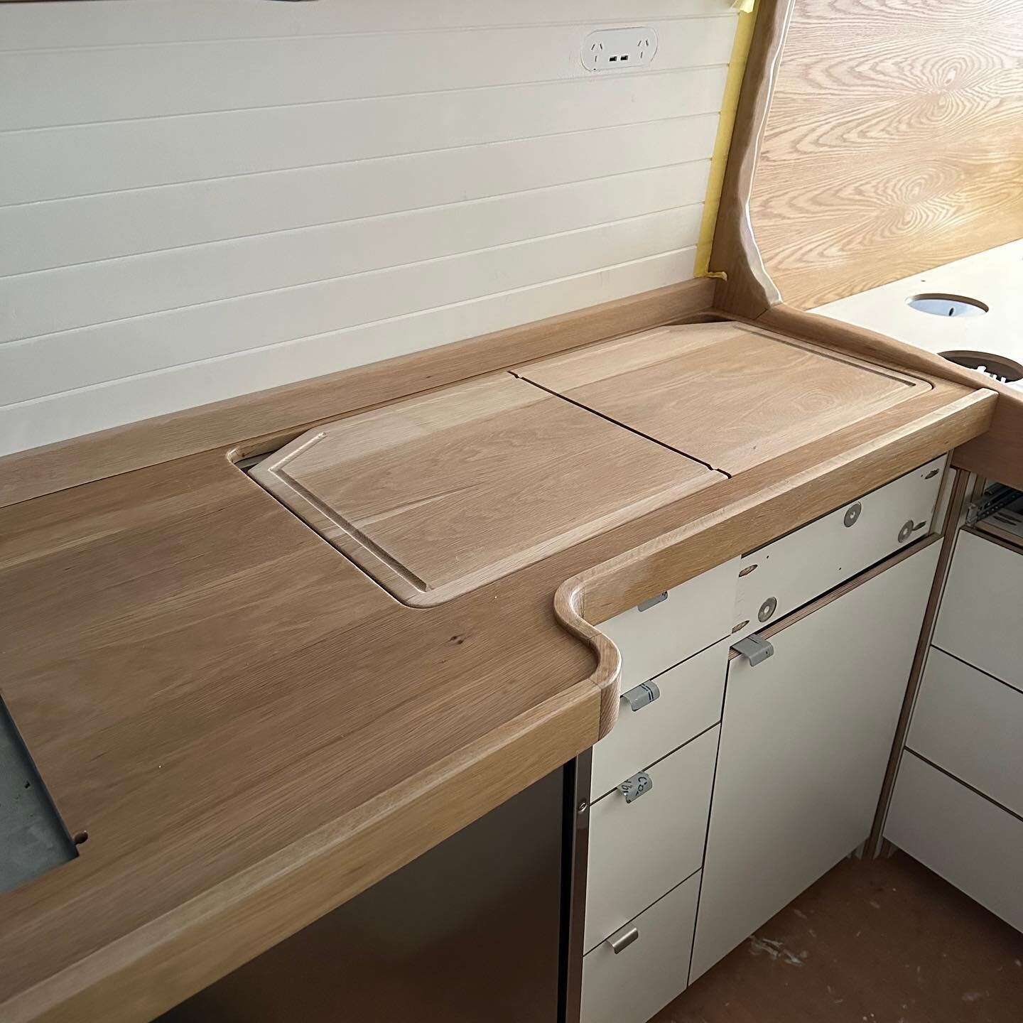 You might not think a bunch of guys would be any good at planning kitchens....well, we're exceptional! ⁠
⁠
Covering the sink and extending the prep space in this van kitchen are timber boards grain matched from the same beautiful timber as the bench 