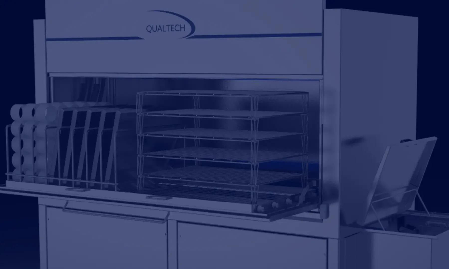Qualtech front load cabinet washer with open door showing racks filled with trays and other parts to be washed.