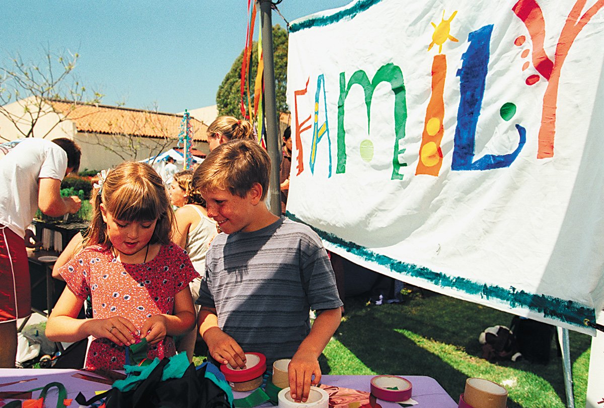  Kids doing Earth Day family activity. 