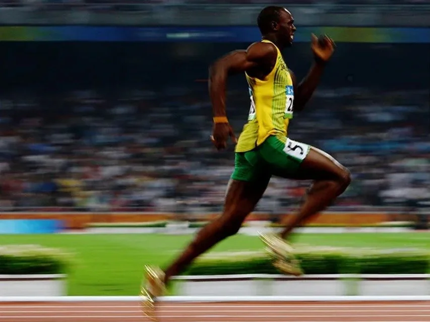Usain Bolt running at the olympics