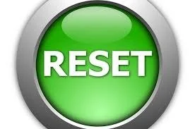 an image of a green button that says reset