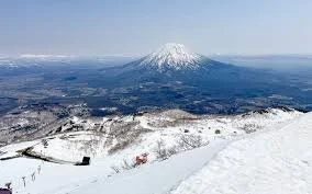 mountain in Niseko , snow capped and at it sbase is Mespi Lodge or Cove niseko