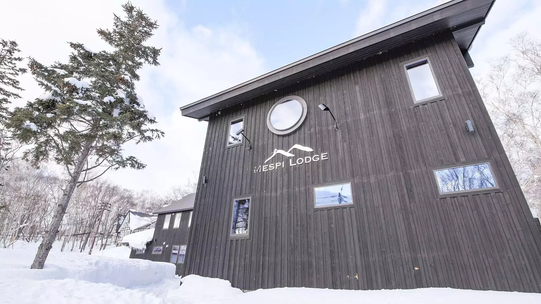 chalet in Niseko in the snow at ski lift