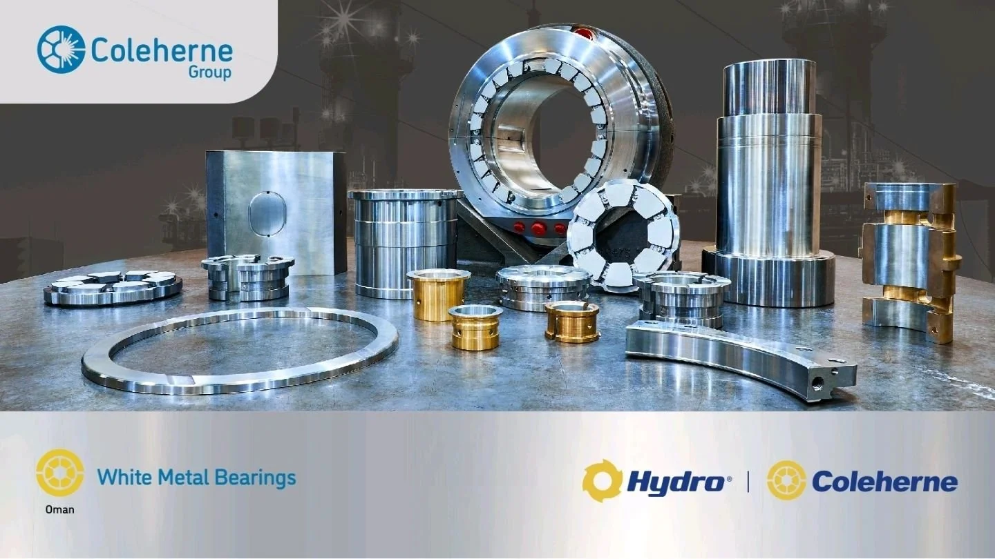 Various metal bearings and components made of white metal and gold-colored metal, arranged on a table with industrial background, featuring logos of Hydro and Coleherne Group.