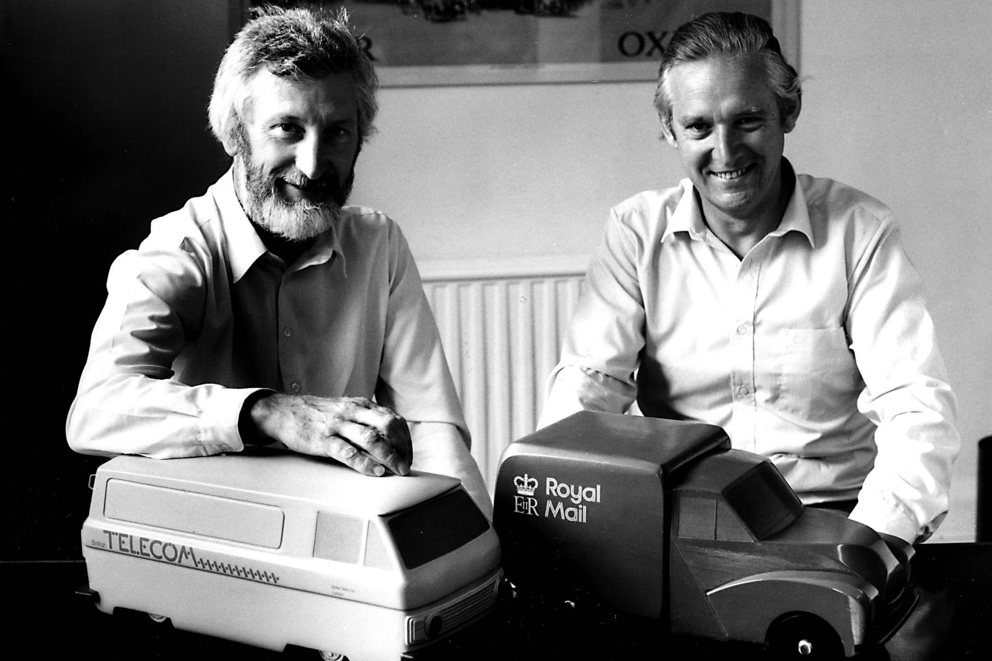  Colin Banks (l) and John Miles (r) with models of British Telecom and Royal Mail vehicles featuring their identities 