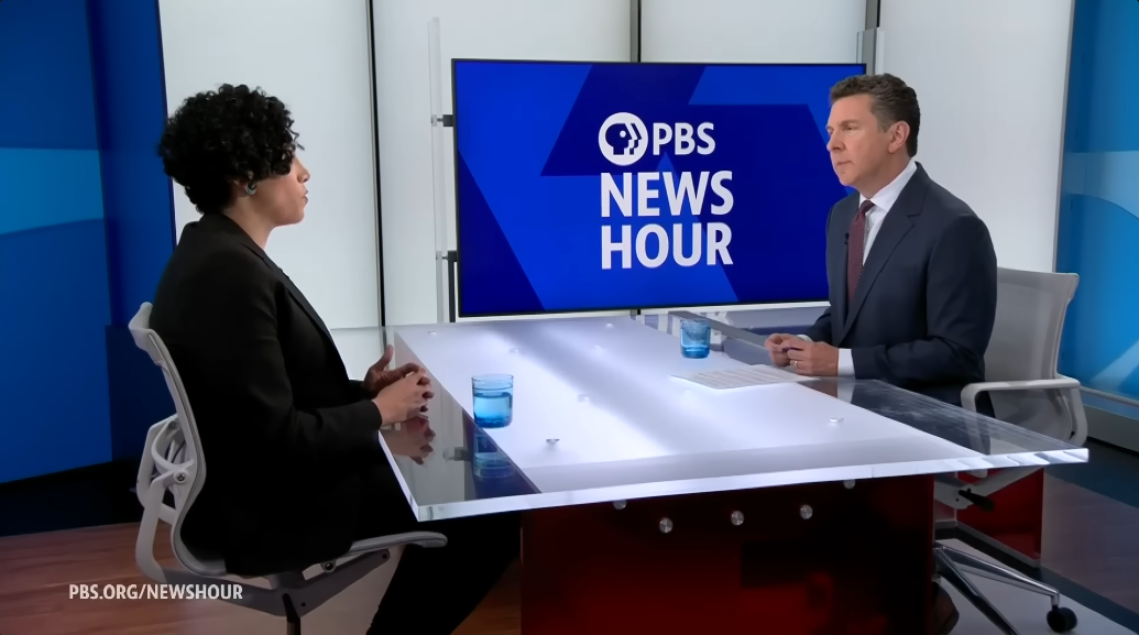 "Alejandra Caraballo being interviewed on PBS NewsHour."