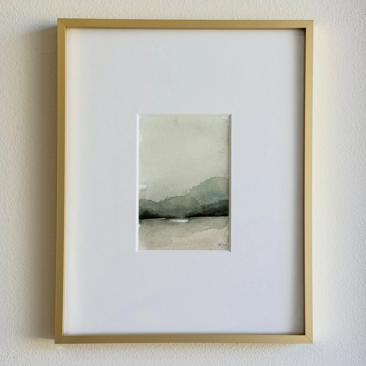 There&rsquo;s something about wide, open land that quiets everything.
Where the horizon softens, the water rests, and time feels unhurried.

This piece was created to hold that feeling&mdash;
a moment of stillness you can come back to.

✨ &ldquo;Lowl