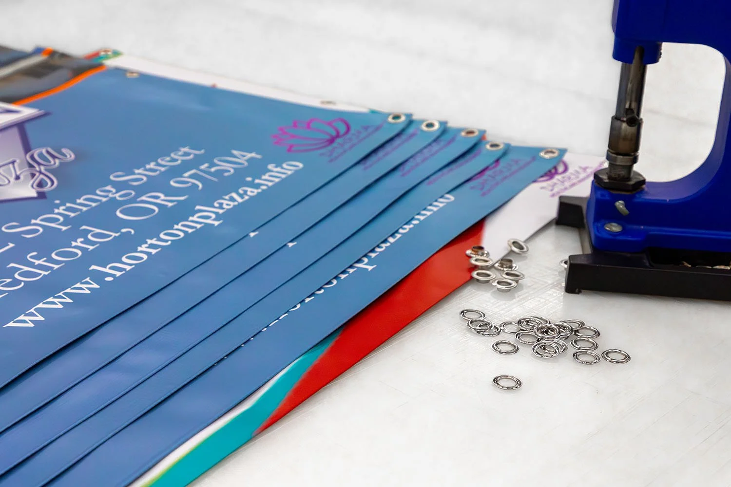 Custom Printed Vinyl Banners Getting Grommets