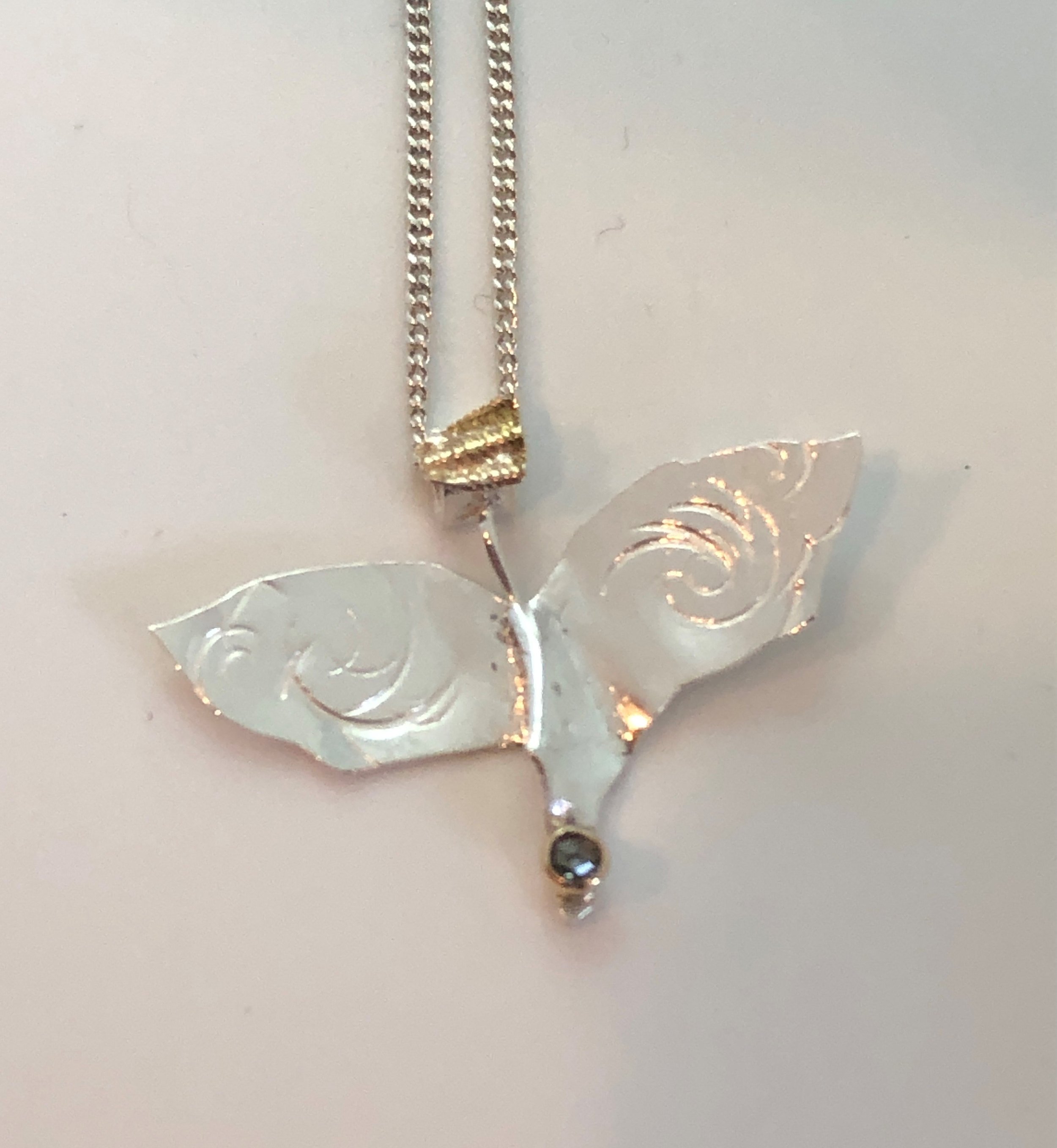 Joan Smith - Whale Tail Necklace.jpeg