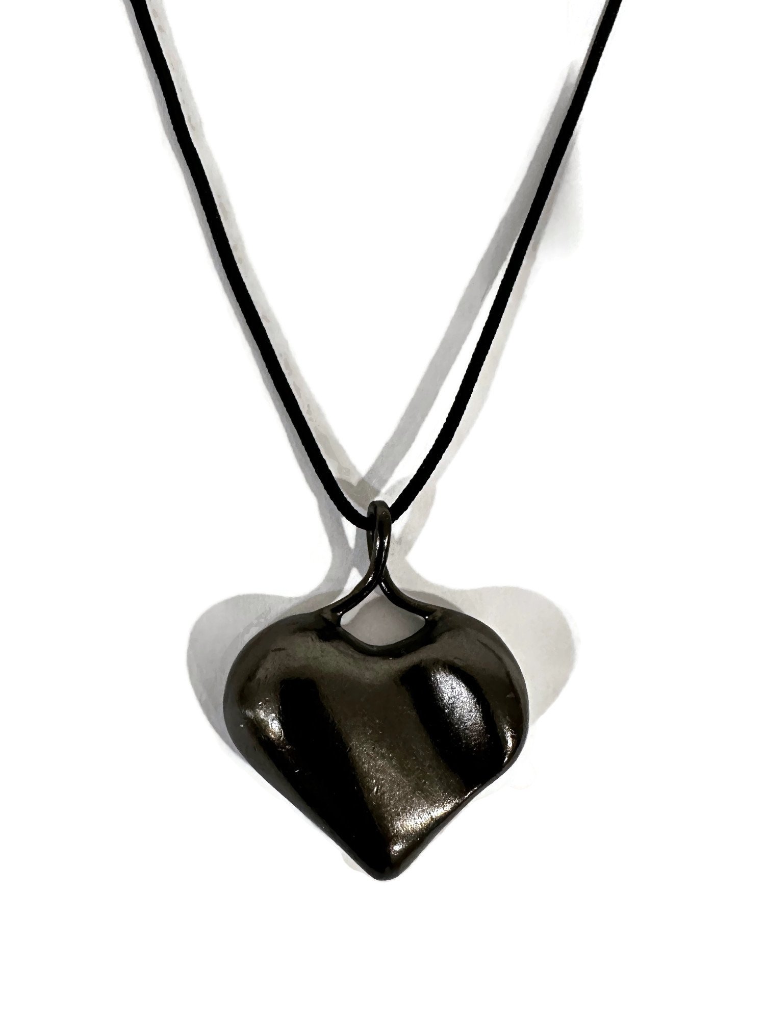 Leesa Storfer- Heart Necklace-Hematite on cord.jpg