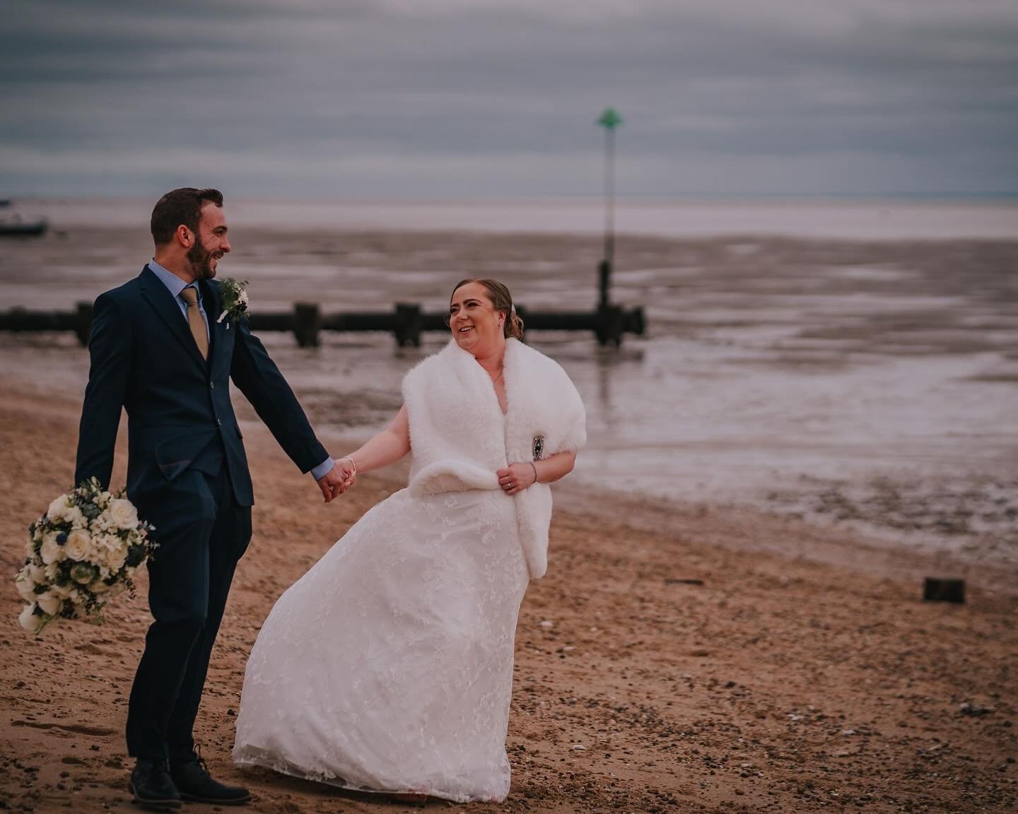 Ahhhhh Lizzie &amp; El&hellip; what more can I say 🤩
The absolute best start to the year, despite needing thermals on that beach 😅
Loved every second, thanks so much for having me 🖤

SUPPLIERS:
@momentstomemoriescontent 
@weddingsbyroslin 
@mrspot