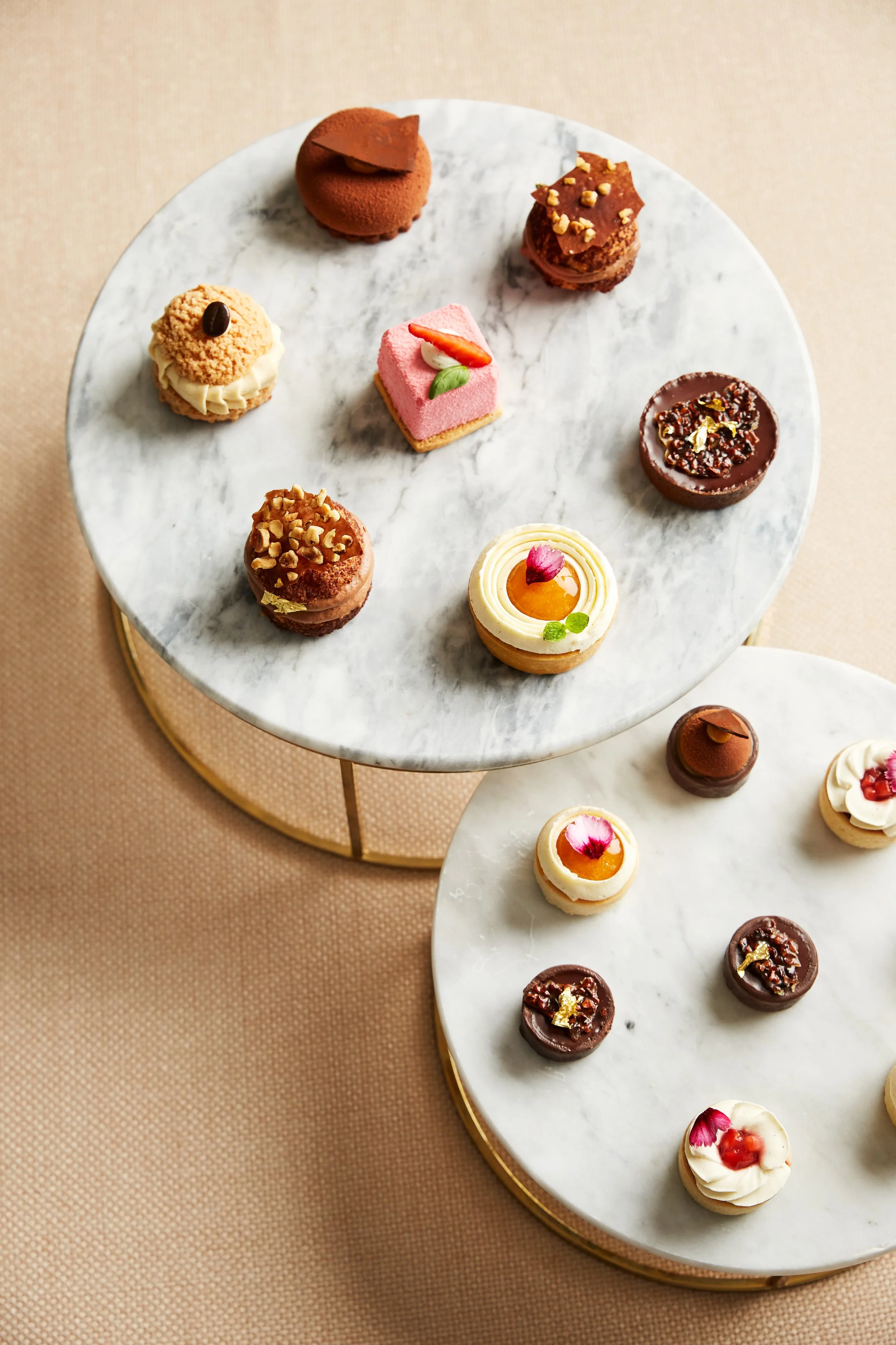 SS25 Dessert Canapes - Apricot & rosemary tart Creme patissiere, apricot and rosemary compote, nappage, fresh apricot (V), Tonka & hazelnut choux Chocolate tonka mousse, hazelnut praline, choux, hazelnut tuile  Str.jpg