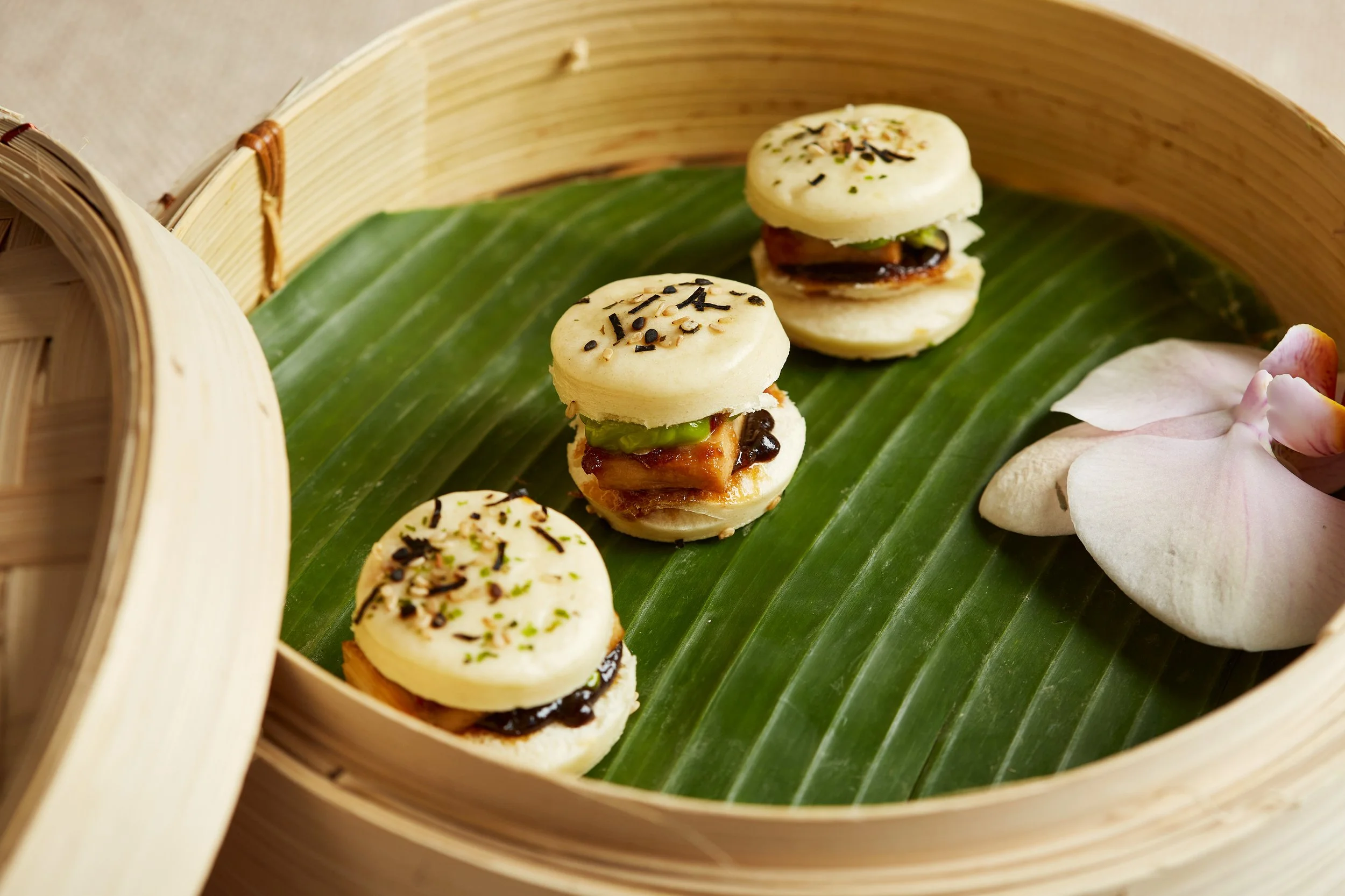 Pork belly bao - slow cooked pork belly, tamarind and black garlic ketchup, green chilli and chive emulsion, spring onion.jpg