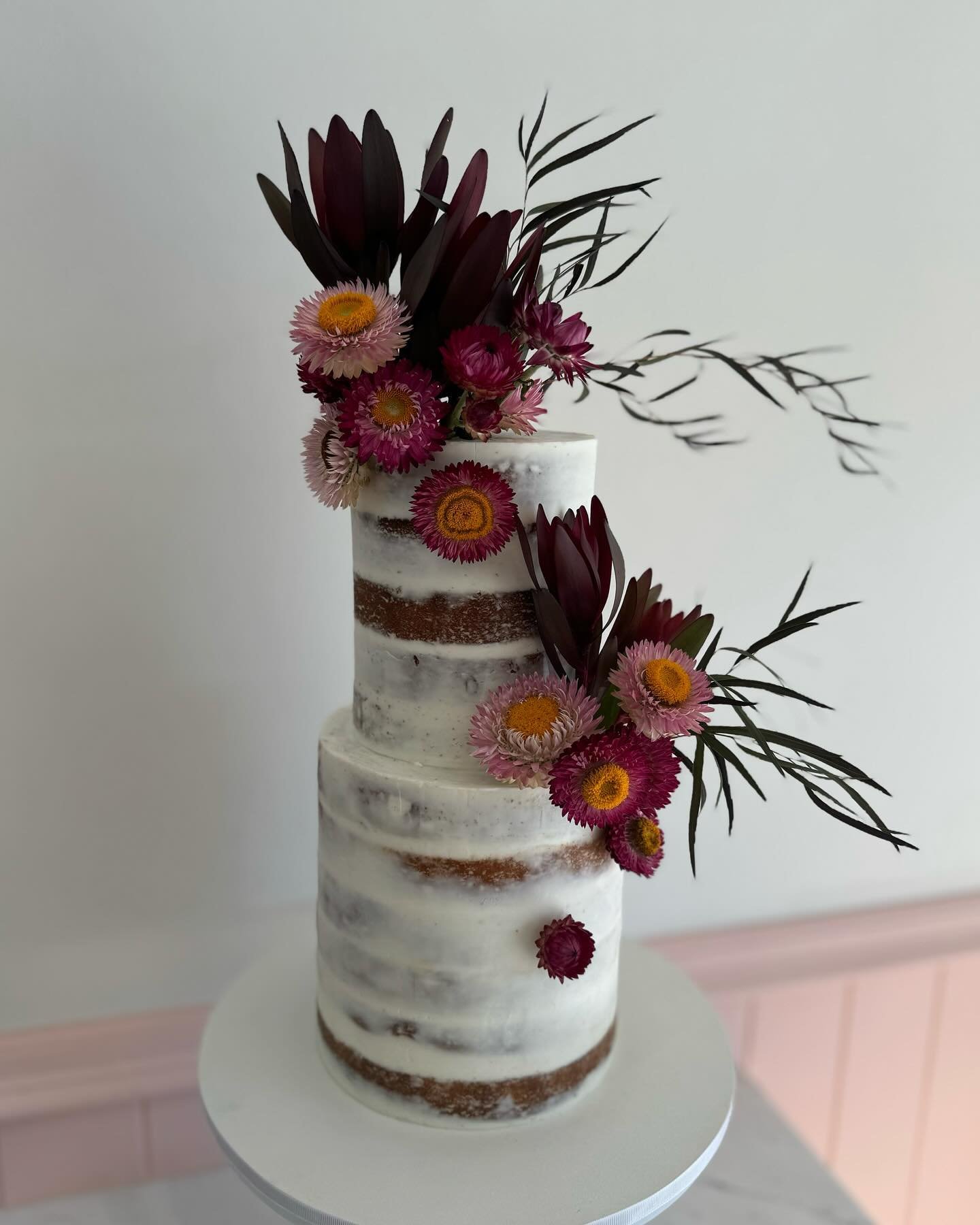 Semi frosted with natives, the sweetest pairing 
.
.
#sydneyweddingcake #sydneywedding #sydneycakes #semifrosted #instacake #cakelover #cakeporm #cakepormsydney