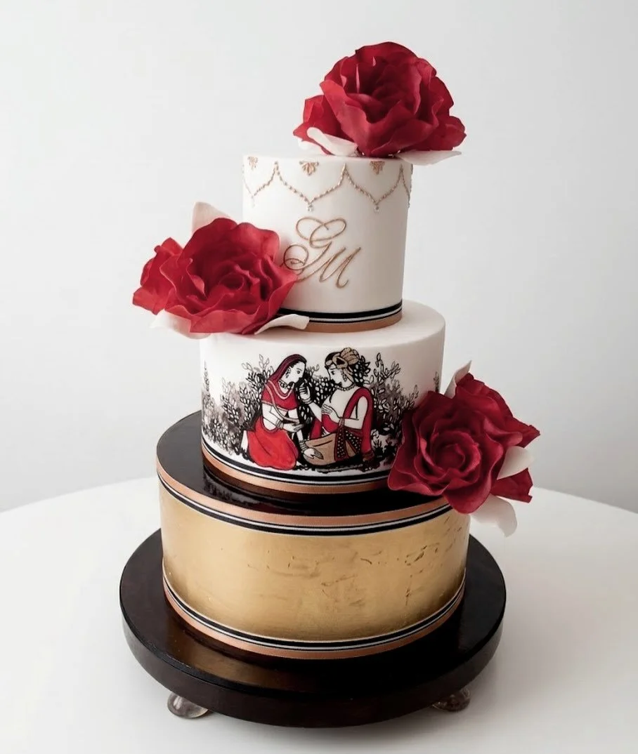 Doing some photo organising and came across this one
Hand painting based on wedding invite, gold leaf and sugar flowers