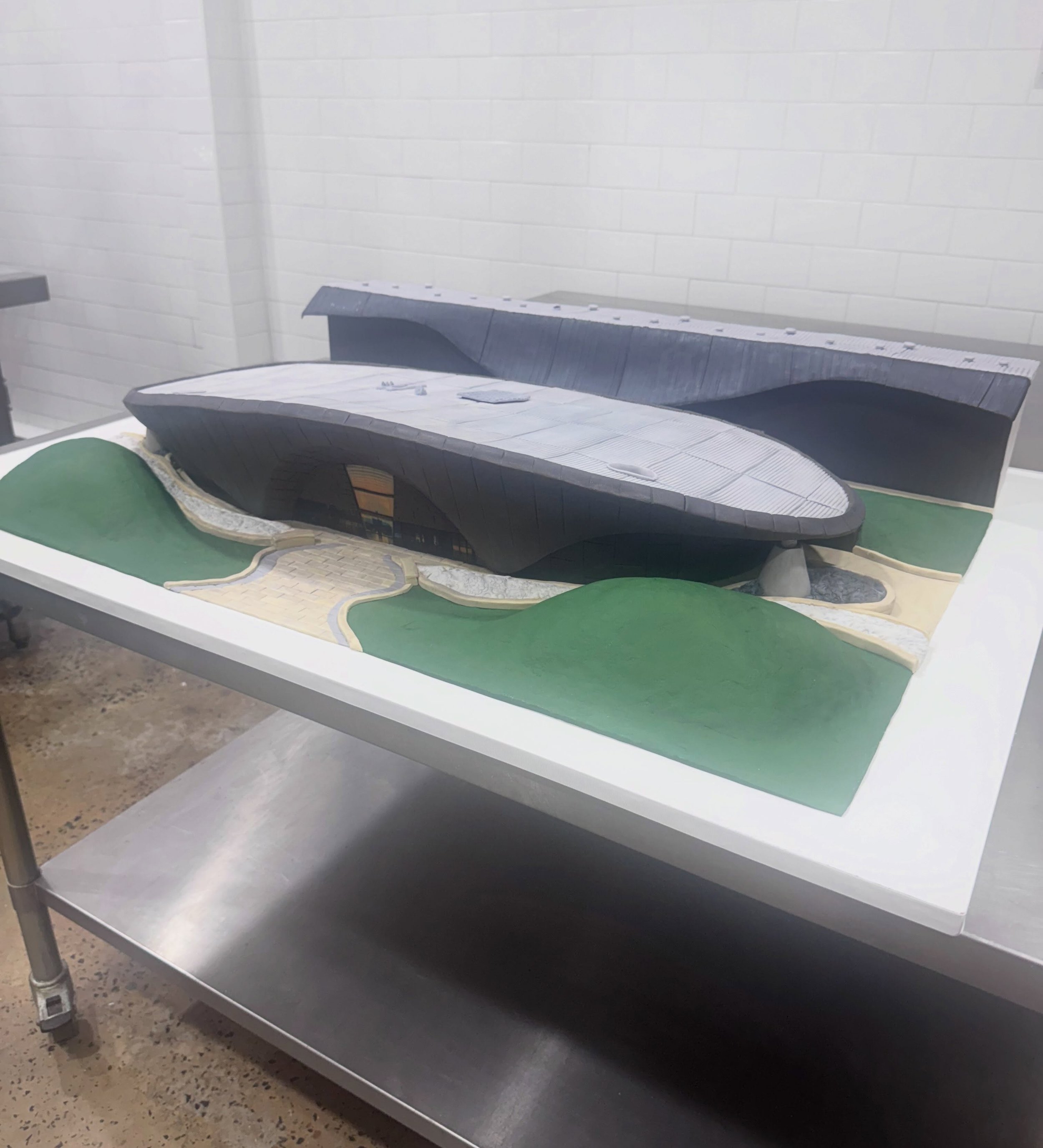 Hard to photograph something so big!
A set of buildings on a board 1200x 900. I enjoyed bringing this one to life, a lot of work and needed a big rest after 
White chocolate sponge with passionfruit ganache, travelled safely on its 5 hour journey