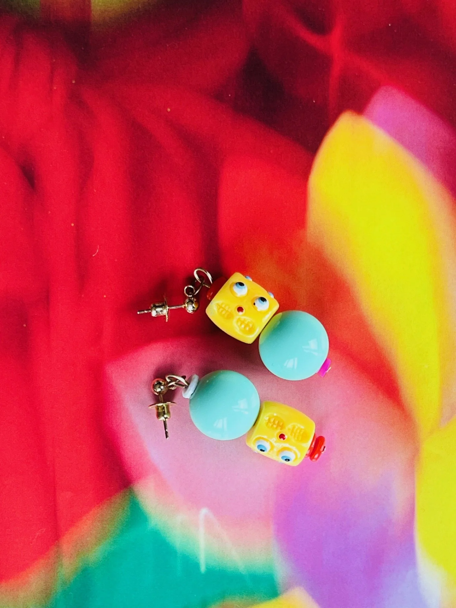 Yellow face earrings