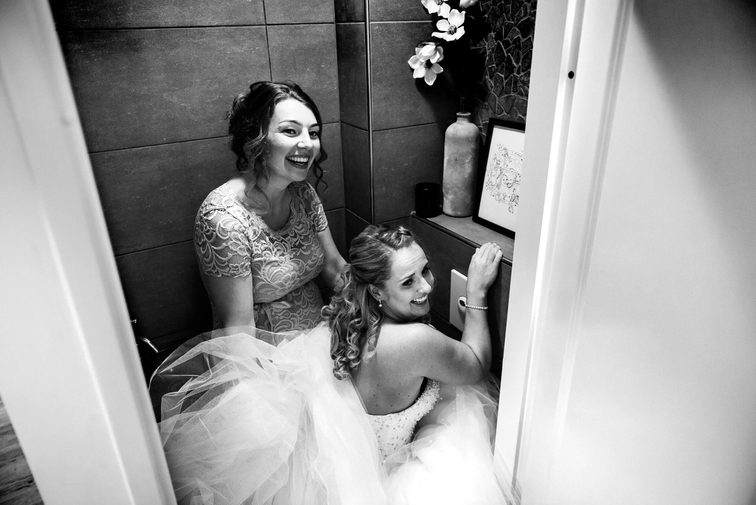 bride on toilet in wedding dress, Holland wedding