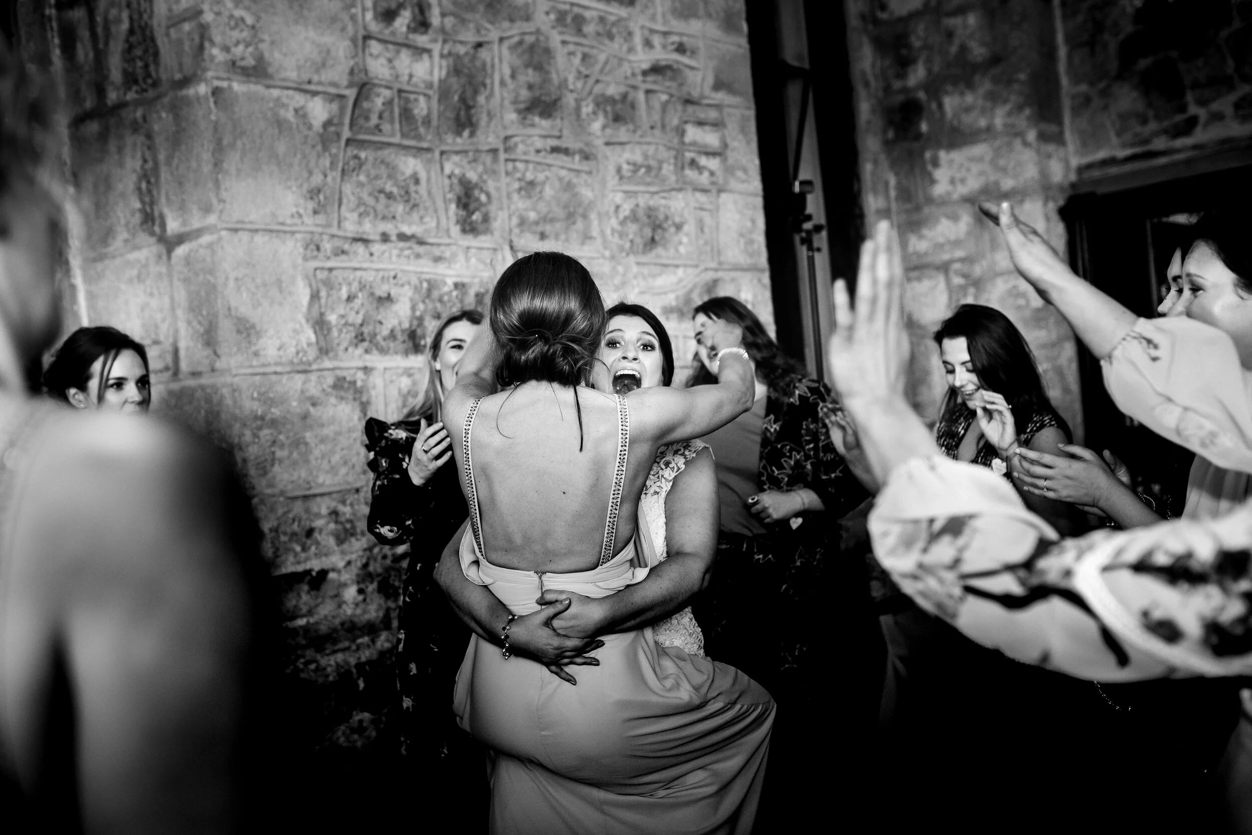 bride and bridesmaid dancing, fun wedding party North Yorkshire wedding