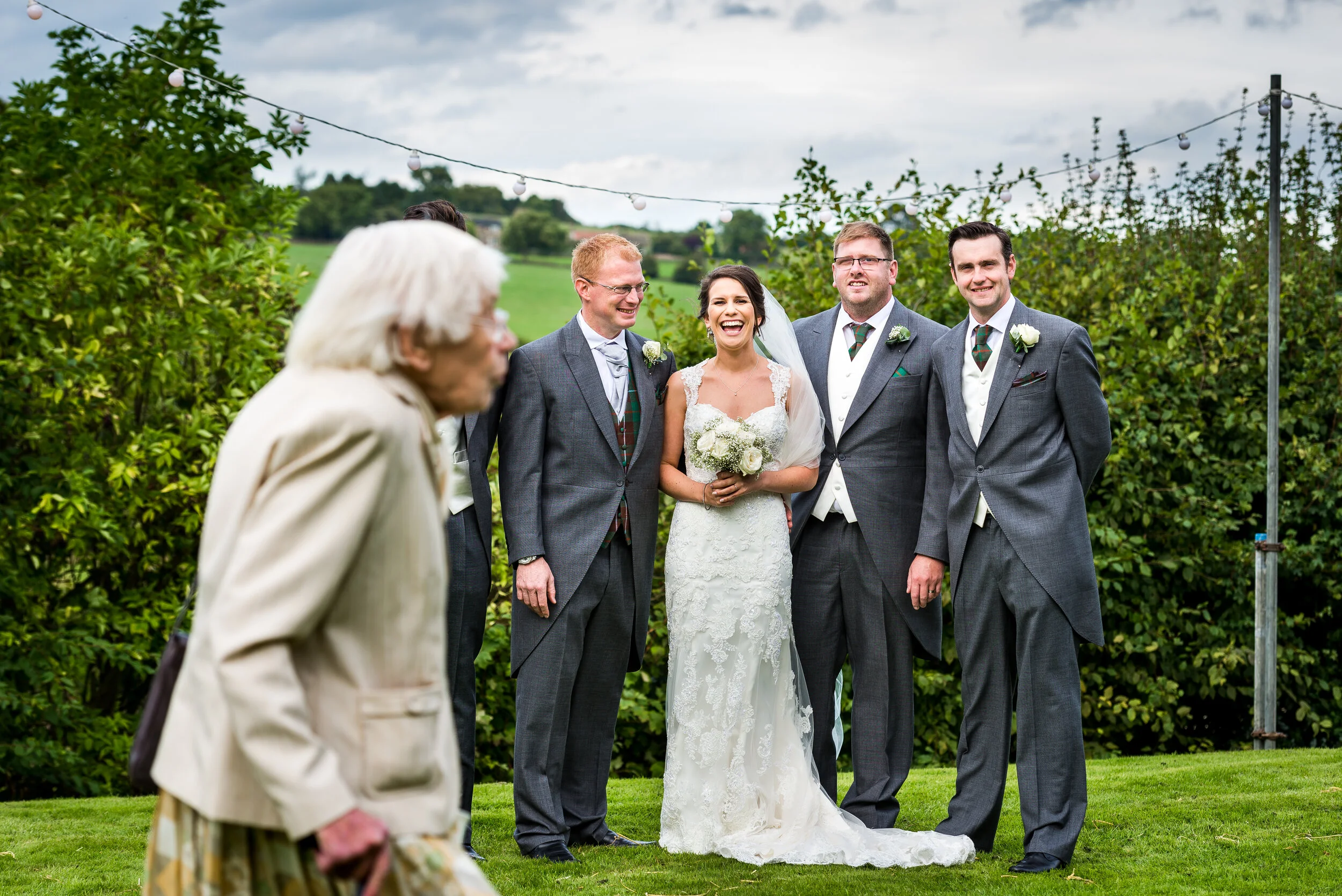 Kettlesing village hall wedding, funny group shot, grandma photobomb, North Yorkshire