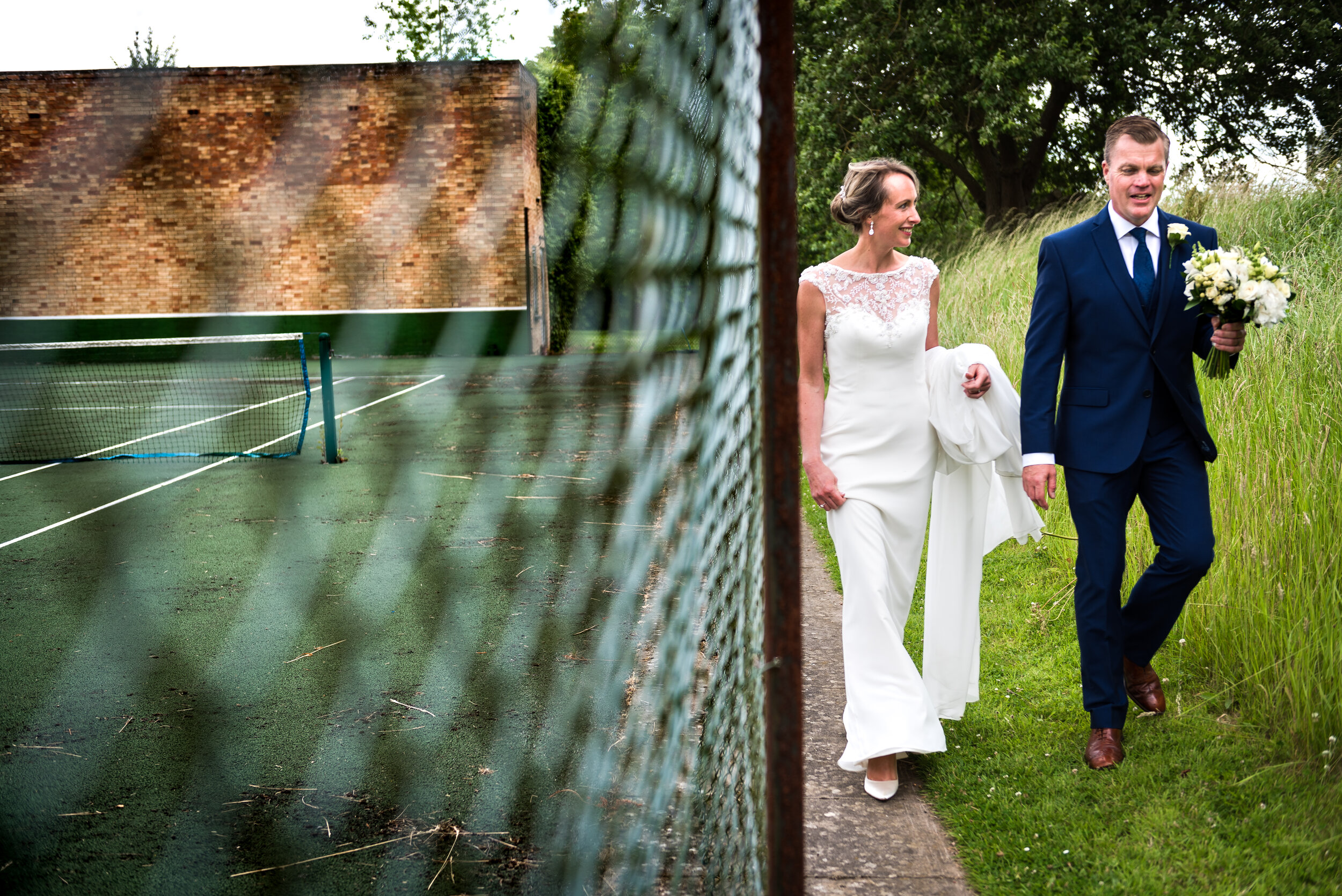 bride and groom at tennis court, Lincoln wedding