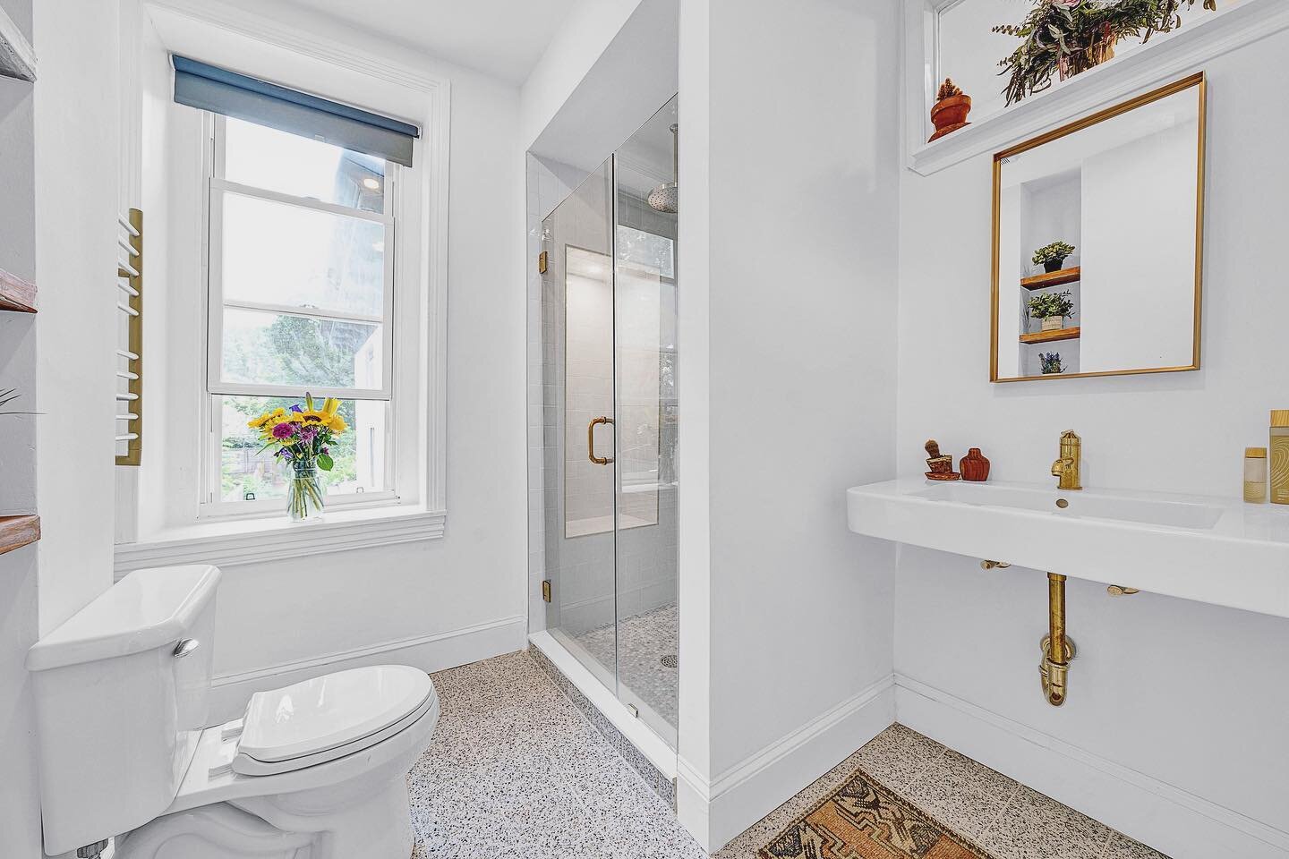 We reworked this Mt Airy home&rsquo;s spare bedroom by partitioning it into three useful, useable rooms/spaces, as opposed a single room without clear definition:
1. An en suite for the master bedroom. 
2. A bijou spin / workout gym. 
3. A 2nd floor 