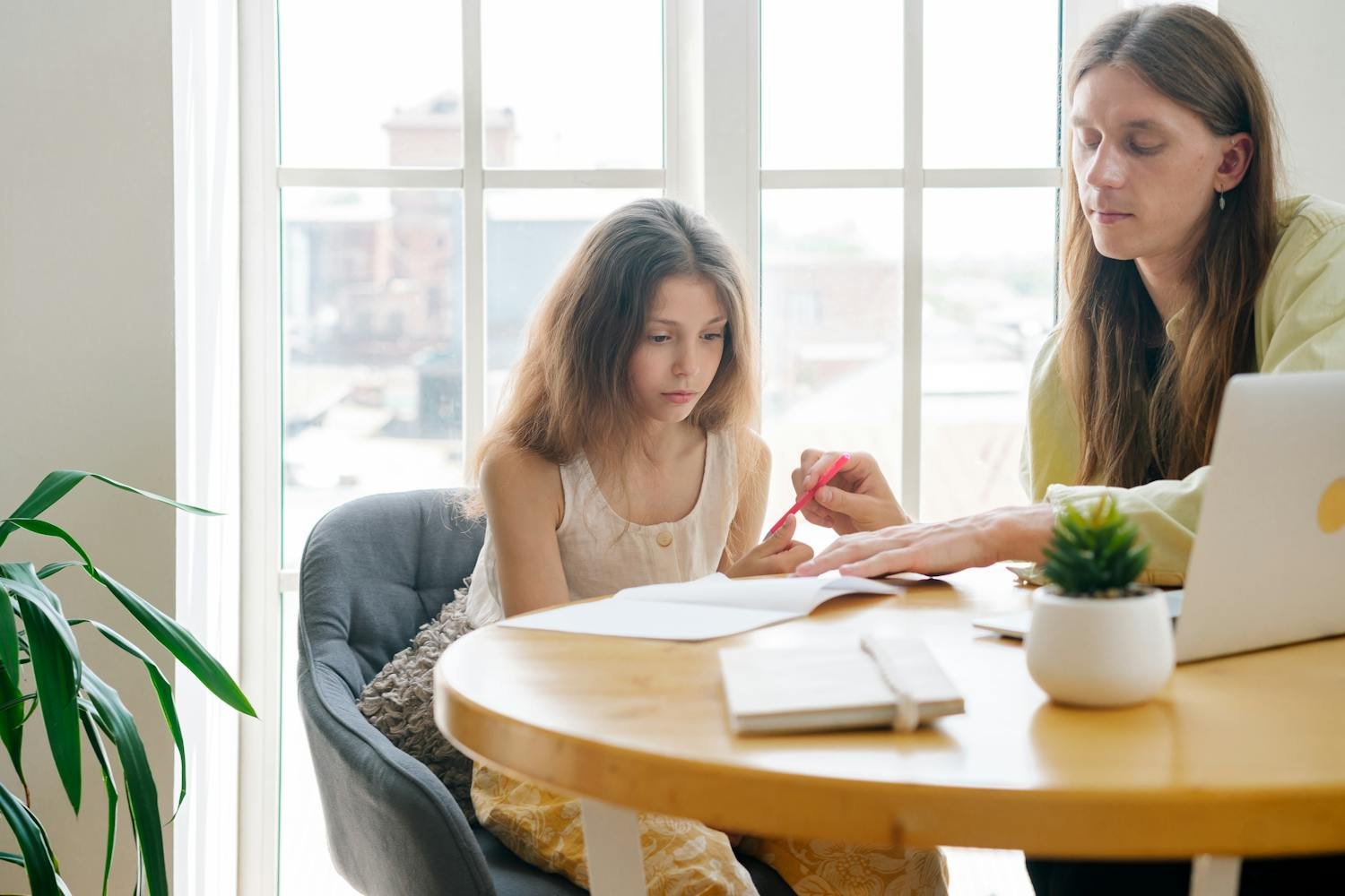 Tutor guiding student through personalized lesson