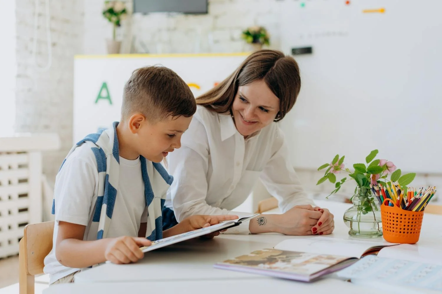 Tutor reviewing core concepts with student