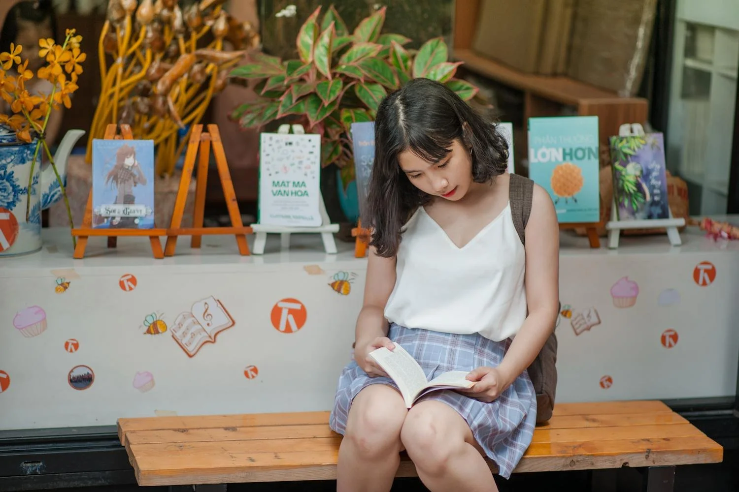 Student reading a STEM book during summer break