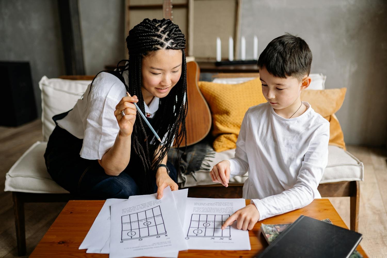 Tutor guiding student through math concepts
