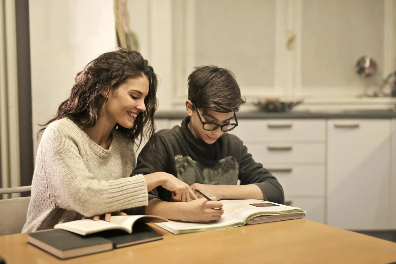 Tutor explaining biology diagram to student