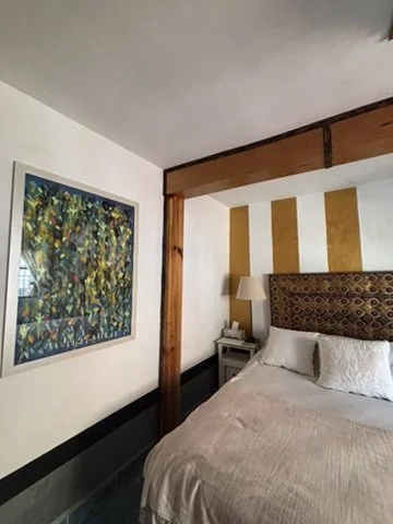 Main bedroom (King) with painting by Rafael Ontiveros
