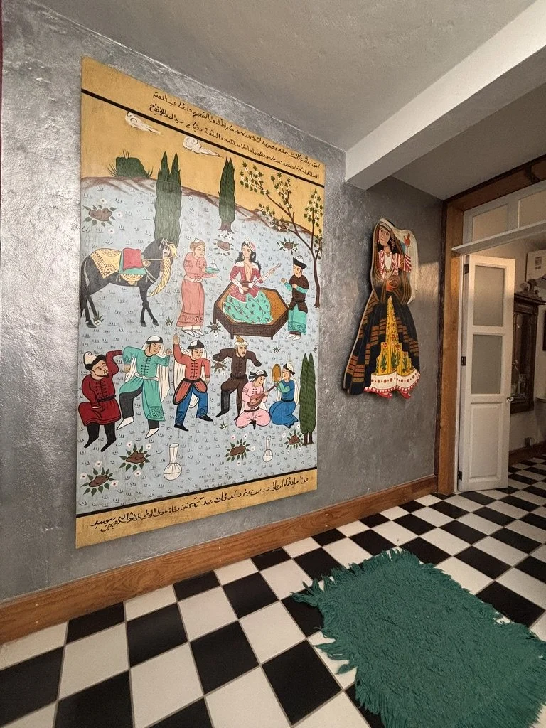 Upstairs hallway with Persian-style art