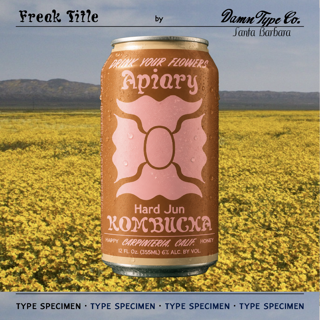 Freak Title font specimen by Damn Type Co., shown on an Apiary hard jun kombucha can with pink and brown lettering, photographed against a field of yellow flowers.
