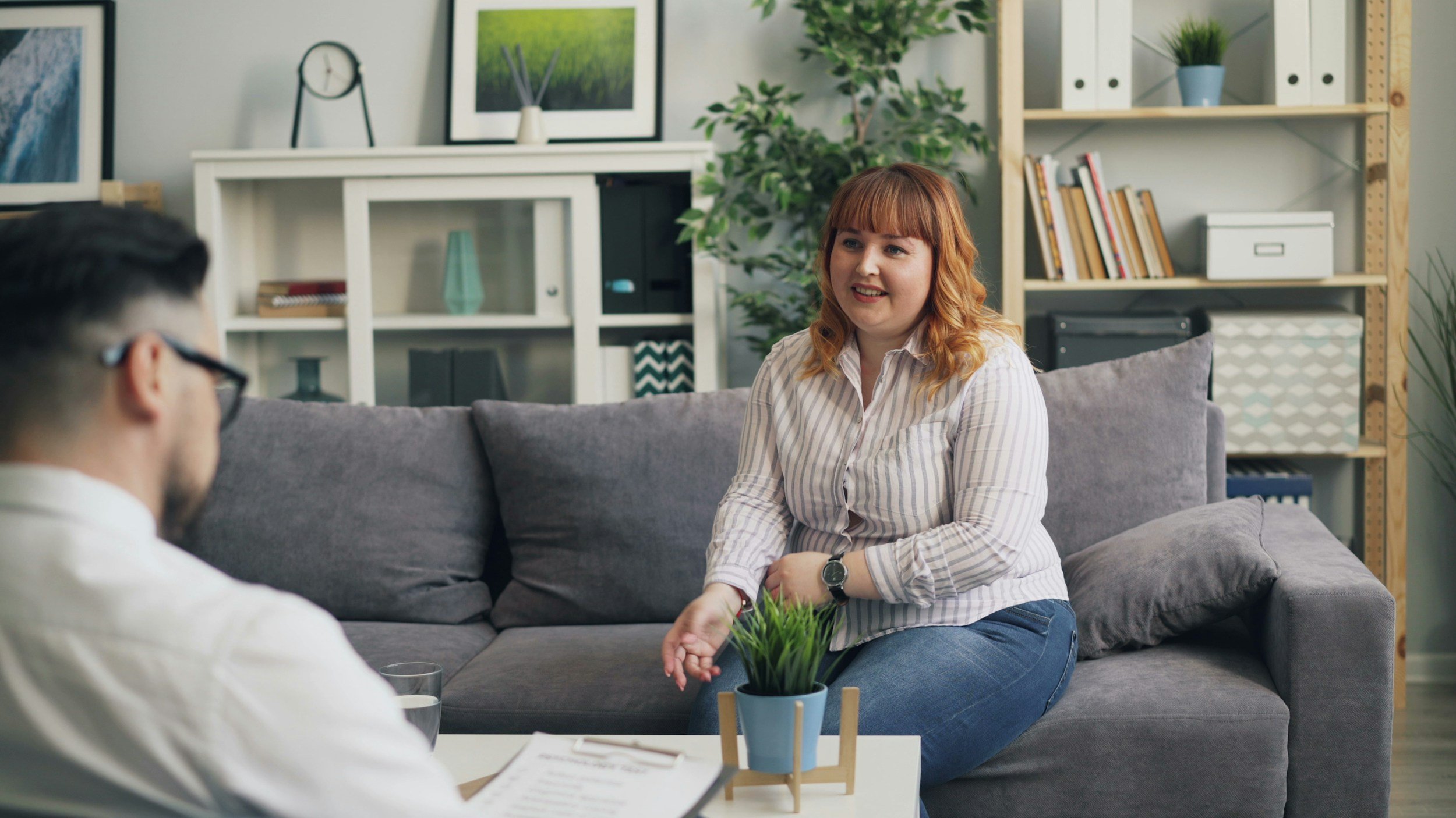 woman getting help for childhood trauma and seeing improvement in her life.